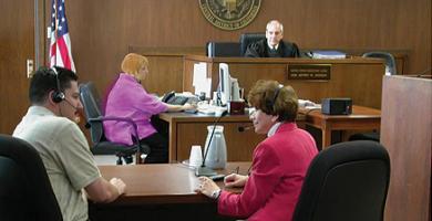 Image of a courtroom and court interpreters