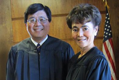 Former Chief Judge Audrey B. Collins (right) passed title and duties to the new Chief Judge George H. King (left) in the U.S. District Court for the Central District of California.