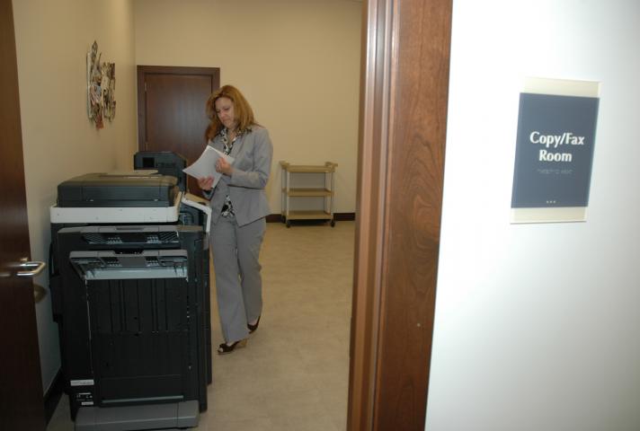 Judicial Assistant Sharon Townsend uses a copy room that is shared by the new suite's judges and court staff.