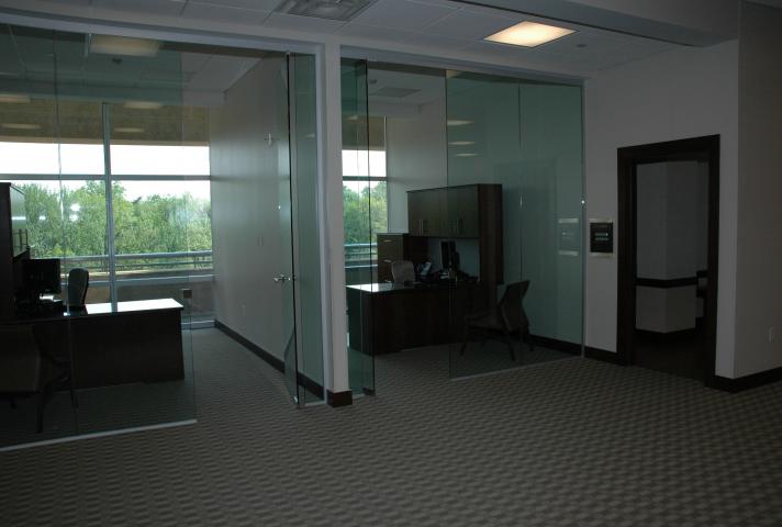 Extensive use of interior glass has enabled natural light to fill the suite.