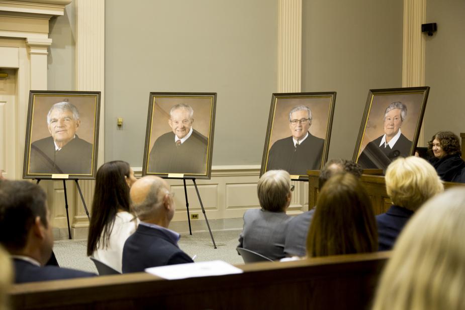 Portraits of retired Magistrate Judges Arthur H. Latimer, F. Owen Eagan, Thomas P. Smith, and Holly B. Fitzsimmons are unveiled at the Richard C. Lee Courthouse in New Haven.