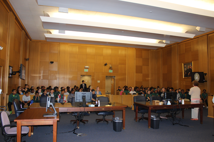 Renee Alexander (far right) speaks to students in Hartford, Connecticut, about how a courtroom functions. Alexander is judicial assistant and courtroom deputy to Senior District Judge  Alfred V. Covello.