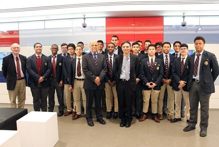 U.S. Court of Appeals Judge Robert A. Katzmann, center-right, and U.S. District Judge Victor Marrero, center-left, pose for a picture with high school students at the learning center in New York.