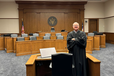U.S. District Judge Robert J. Conrad Jr. in a Virginia Revival Model courtroom.