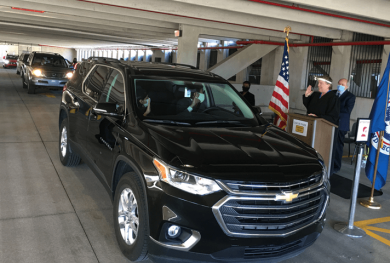 Image of a drive-through naturalization ceremony