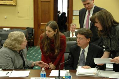 Judge Julia Gibbons, Conference Budget Committee Chair, reviews final details of the Judiciary's budget request with former director James Duff and AO staff.