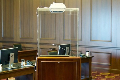 An enclosed lectern for lawyers is equipped with an air filter in the Southern District of New York.