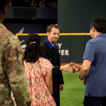 U.S. District Judge Brantley Starr at a naturalization ceremony ahead of a Texas Rangers game. 