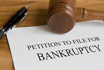 A representation of paperwork to file for bankruptcy.