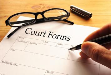 Filling in a court form.