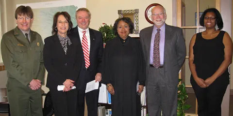 Left to right: Dave Schafer, Acting NPS Superintendent; Pam Patton, Deputy Clerk; Lee M. Smithyman, President, Kansas Bar Association; Federal District Judge Julie A. Robinson; Pedro L. Irigonegaray, Naturalization Chairman, Topeka Bar Association; Andrea Left to right: Dave Schafer, Acting NPS Superintendent; Pam Patton, Deputy Clerk; Lee M. Smithyman, President, Kansas Bar Association; Federal District Judge Julie A. Robinson; Pedro L. Irigonegaray, Naturalization Chairman, Topeka Bar Association; Andrea