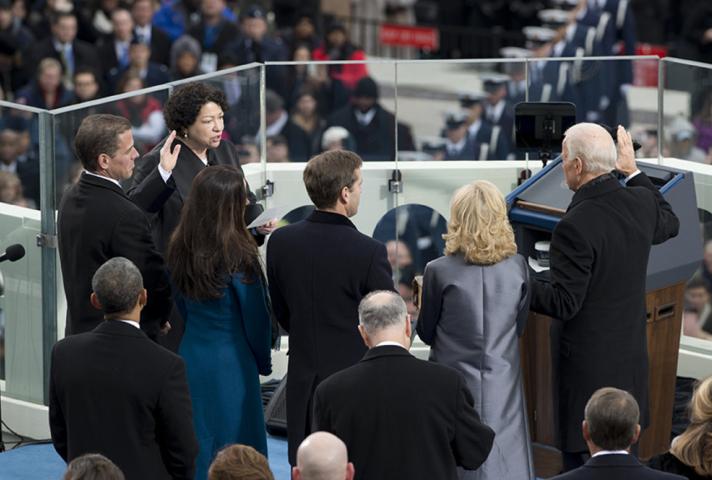 Associate Justice Sonia Sotomayor swears in Vice President Biden, with his family looking on.