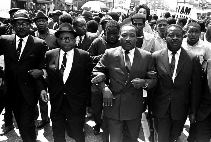Martin Luther King, Jr., leads a sanitation workers' protest that dissolved into vandalism.