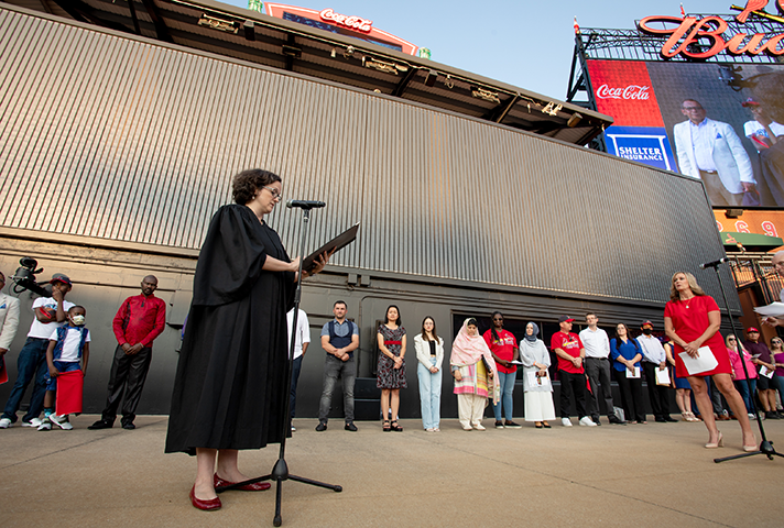U.S. District Judge Sarah E. Pitlyk welcomes new citizens at Busch Stadium in St. Louis. Credit: St. Louis Cardinals.
