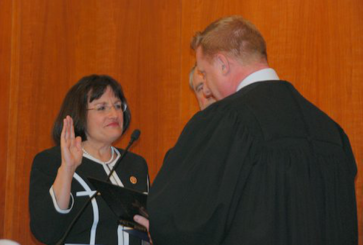 Rep. Ann McLane Kuster (D-NH) is sworn in by Chief Judge Joseph N. Laplante, of the District of New Hampshire.