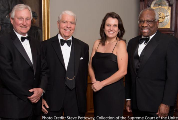 AO Director Thomas F. Hogan, second from left, is flanked by the committee that gave him the Devitt Award. From left, they are Joel F. Dubina, chief judge of the U.S. Court of Appeals for the Eleventh Circuit; Lisa Godbey Wood, chief judge of the U.S. Dis