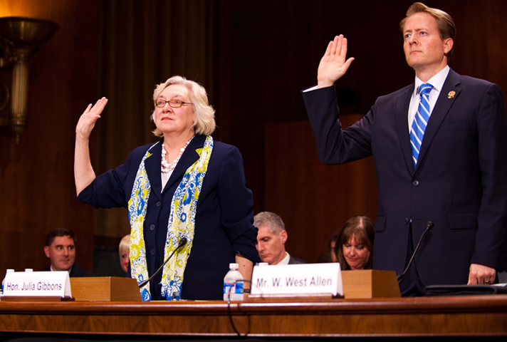 Judge Julia S. Gibbons and W. West Allen, of the Federal Bar Association, are sworn in before testifying.