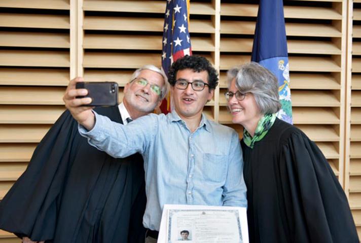 Judges in Maine take selfie with new citizen.