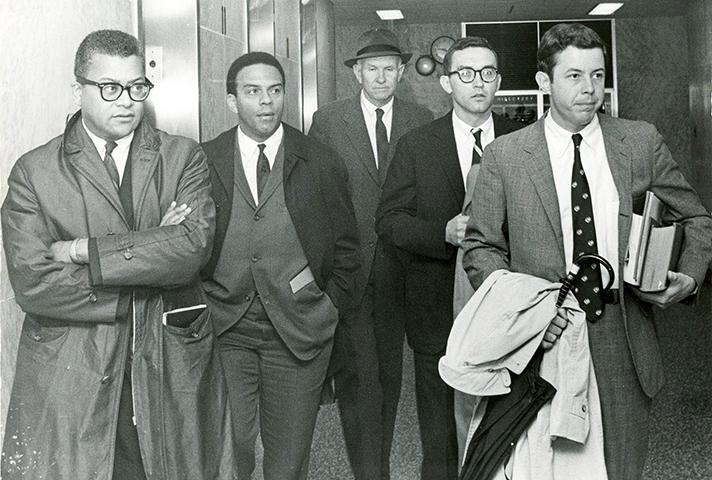 On April 4, civil rights leaders James Lawson and Andrew Young, left, enter a federal courtroom with their lawyers.On April 4, civil rights leaders James Lawson and Andrew Young, left, enter a federal courtroom with their lawyers.