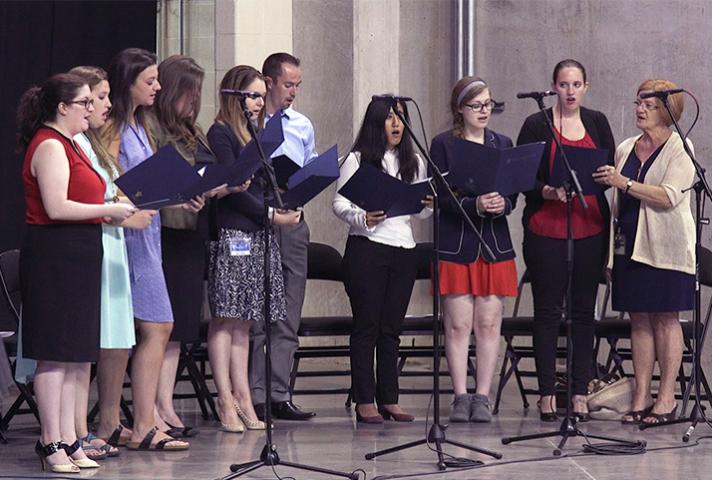 Saint Louis University law school choir sings.