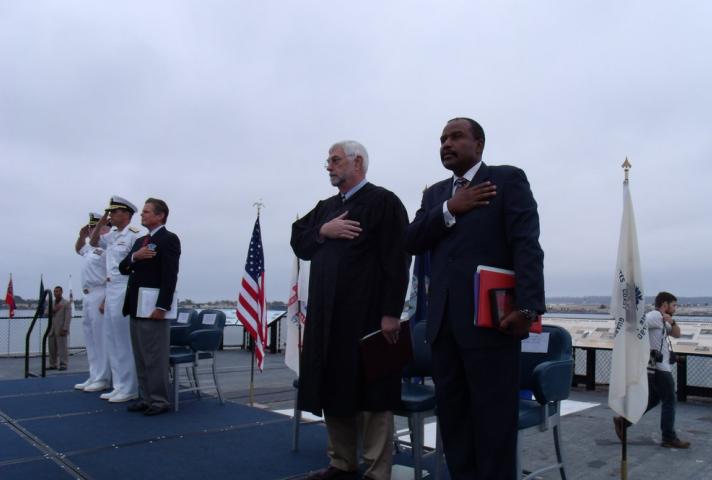 Chief Bankruptcy Judge Peter Bowie (S.D. Calif.) presided over the naturalization ceremony held on the USS Midway.