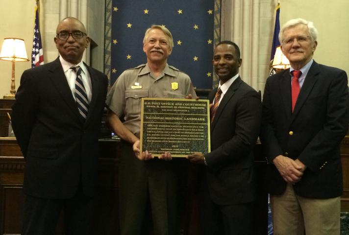 National Park Service presents plaque to Frank M. Johnson Jr. Federal Building and U.S. Courthouse in Montgomery, Alabama on July 20, 2015.