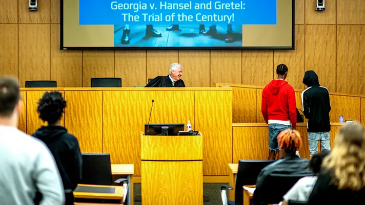 High school students practice legal and life skills as they participate in a mock trail.
