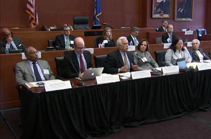 CJA panel listens to testimony. 