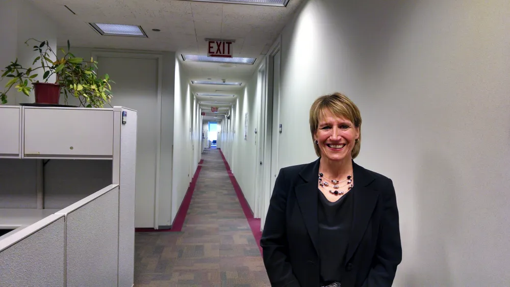 Jeanne Walsh, Chief U.S. Probation Officer for the Northern District of Illinois, said her current office layout, with long halls and private offices, no longer suits a downsized staff that spends many hours in the field. Jeanne Walsh, Chief U.S. Probation Officer for the Northern District of Illinois, said her current office layout, with long halls and private offices, no longer suits a downsized staff that spends many hours in the field.