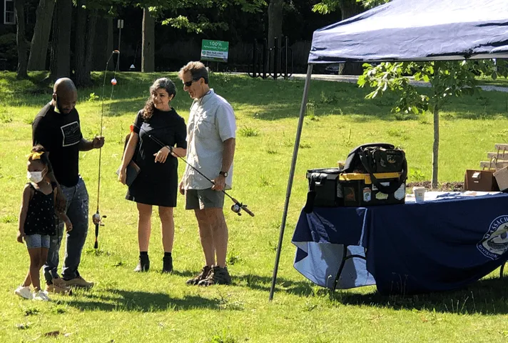 People under supervision in Massachusetts go fishing with their children as part of the federal probation office’s Fatherhood Program, which teaches parenting techniques. 