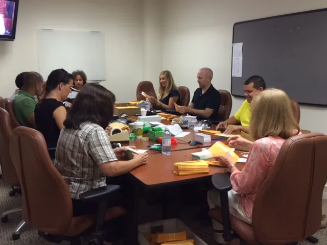 In a five day marathon, staff from the clerk’s office in the District of New Jersey prepared a mailing of restitution checks to over 18,000 victims in a telemarketing fraud and identity theft case. An image of court staff from the clerk’s office in the District of New Jersey prepared a mailing of restitution checks to over 18,000 victims in a telemarketing fraud and identity theft case.