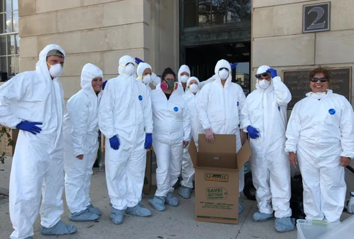 Image: Staff from the North Carolina Eastern Probation and Pretrial Services Office wore protective clothing as they entered the mold ridden courthouse in Wilmington.