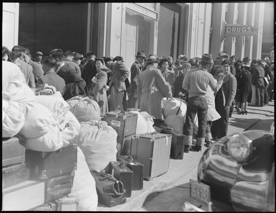 In San Francisco, Japanese Americans wait for train to internment camps. 
