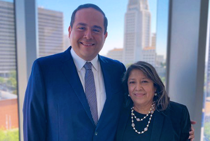 Cuauhtemoc Ortega and his mother following his swearing-in as the new federal public defender at the federal courthouse in Los Angeles.