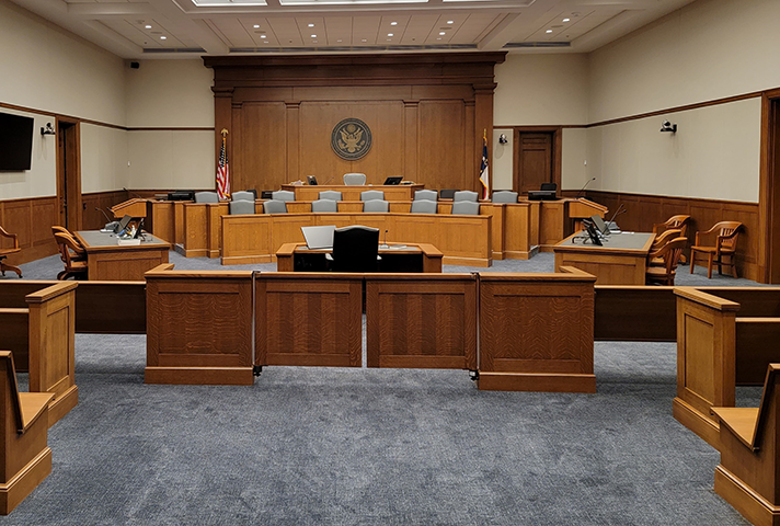 A new courtroom in Charlotte, N.C., replicates an Albermarle County, Virginia, courtroom designed by Thomas Jefferson. The jury box is placed in the center, in front of the judge, while counsel tables are placed to the side. 