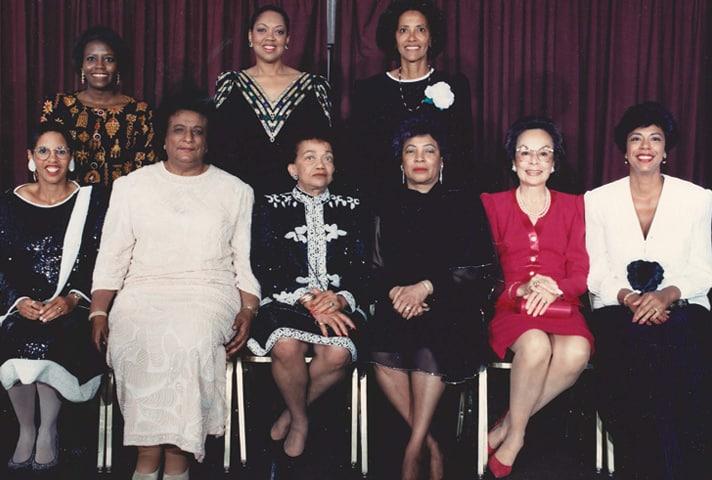 Constance Baker Motley, the first African American woman to serve as a federal judge, poses with a group of colleagues. 