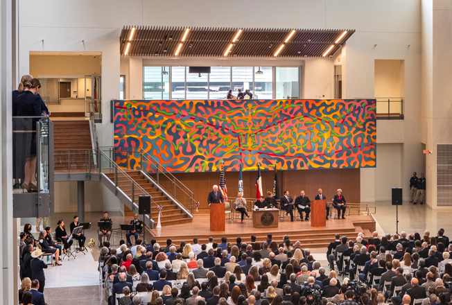 A living mural serves as the visual focal point for the courthouse atrium.  The title 