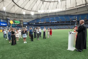 U.S. Magistrate Judge Sean Flynn, welcomes new U.S. citizens at Tropicana Field in St. Petersburg, Florida